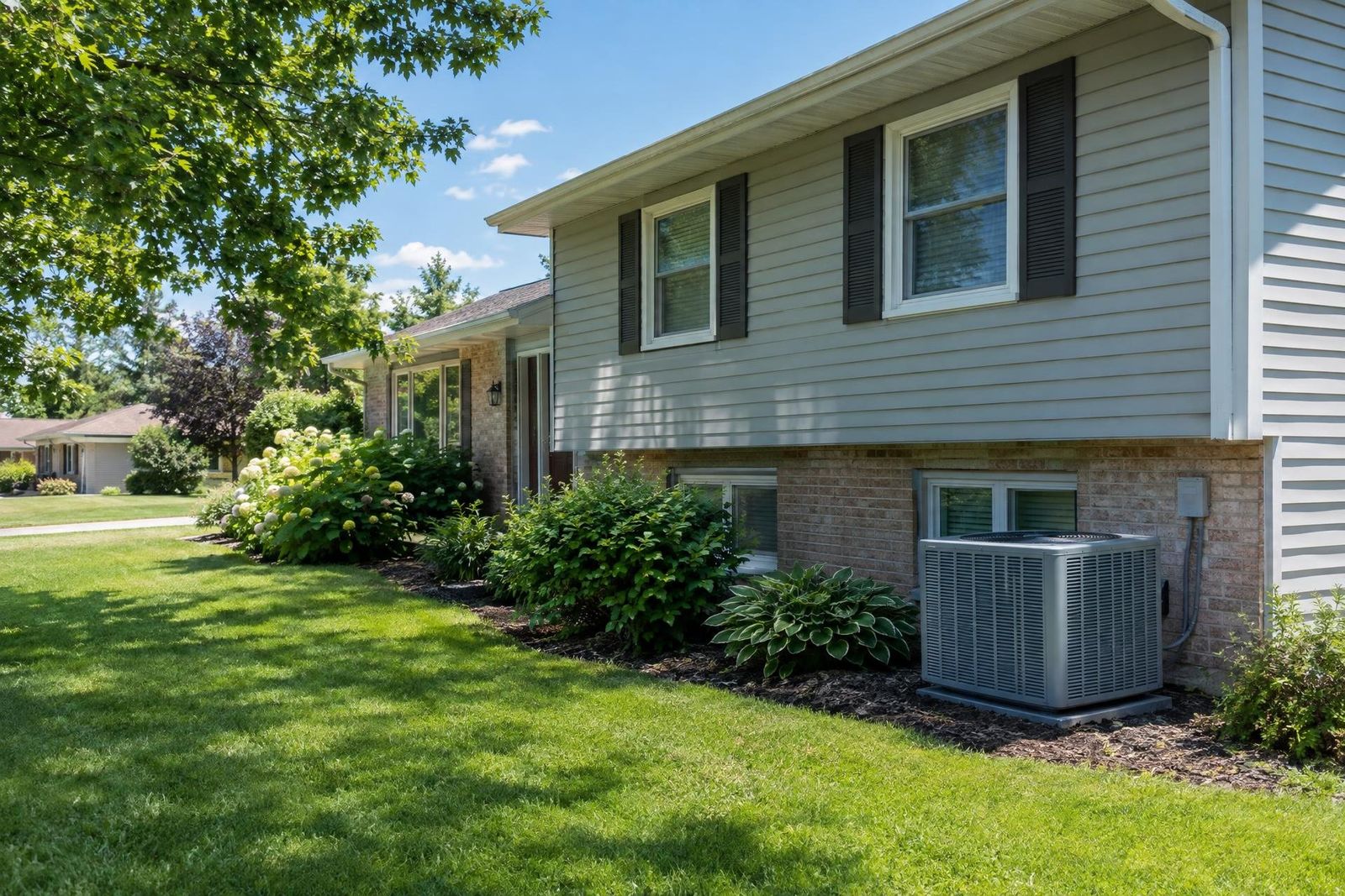 Residential exterior with outdoor air conditioning unit